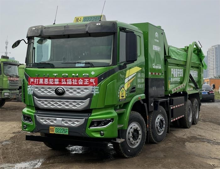 “清一色綠色軍團”,“鐵粉”為啥一次性訂購50臺宇通新能源重卡?